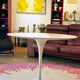 Knoll International table circa 1960, melamine wood top, white lacquered cast iron legs