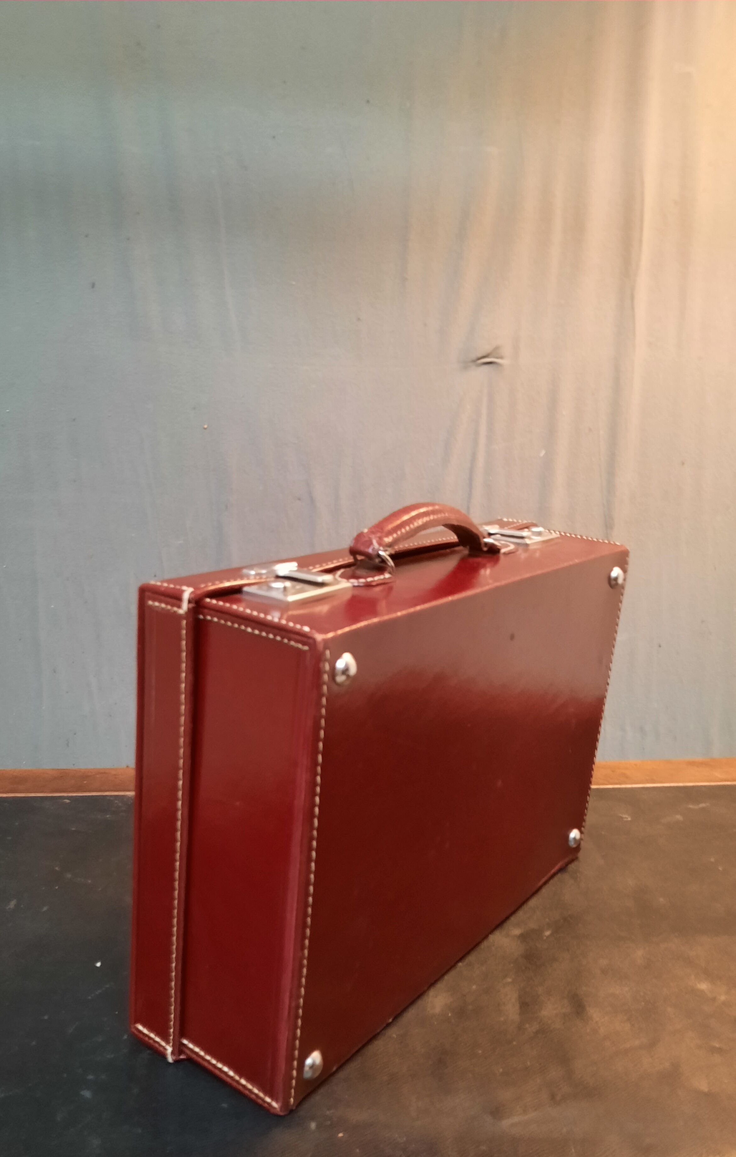 Red leather suitcase