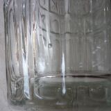 Transparent glass vase with art deco geometric patterns