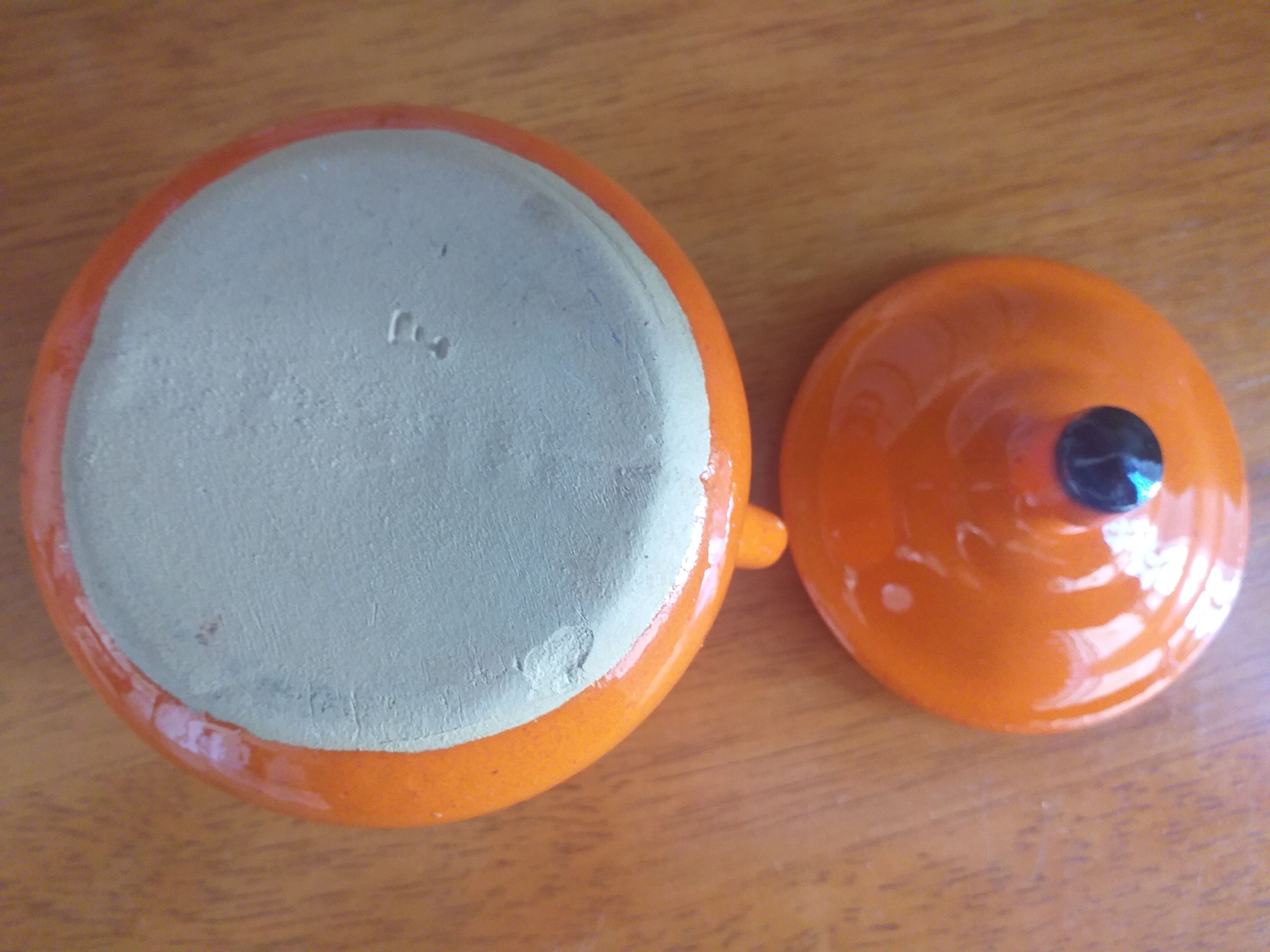 Sugar pot in orange enamelled sandstone
