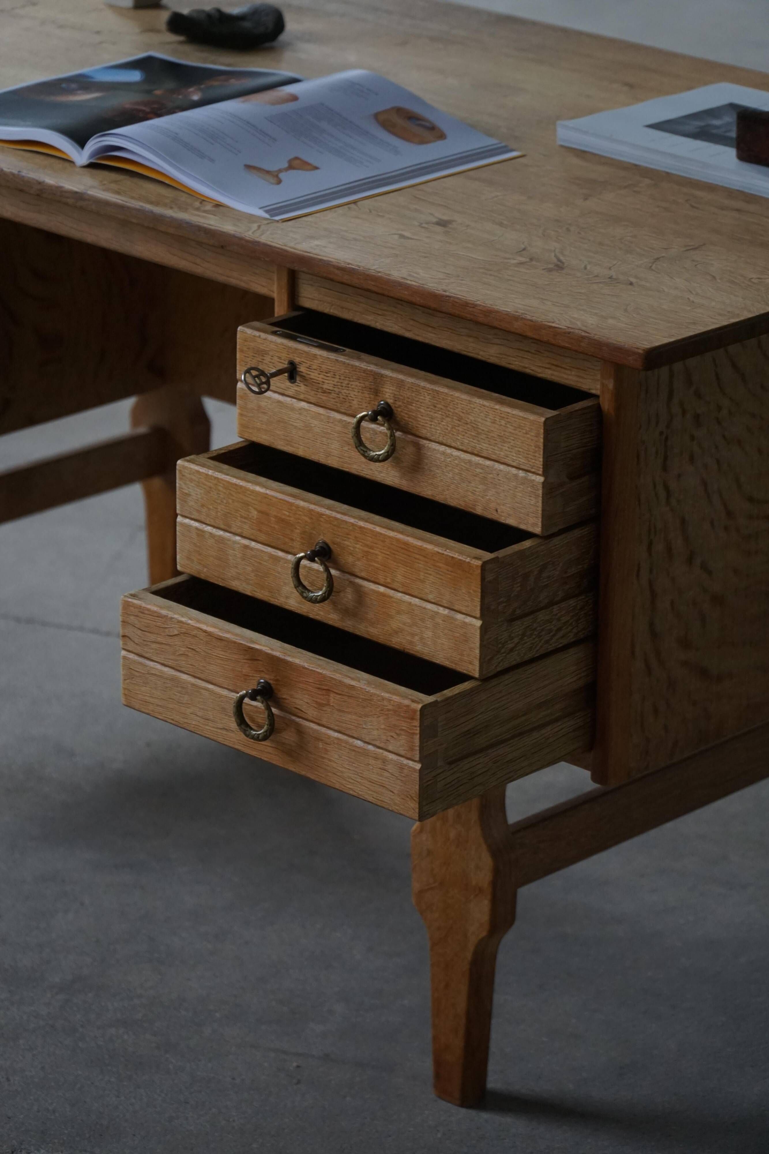 Free-standing oak desk by Henning Kjærnulf, mid-century Danish modernism, 1950s.