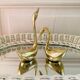 Couple of brass swans