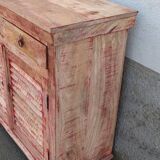 Wooden sideboard with red highlights