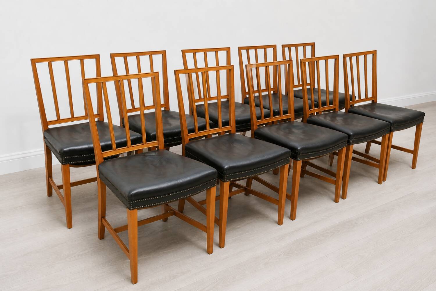 10 antique Josef Frank model 620 chairs in walnut wood from Svenskt Tenn.