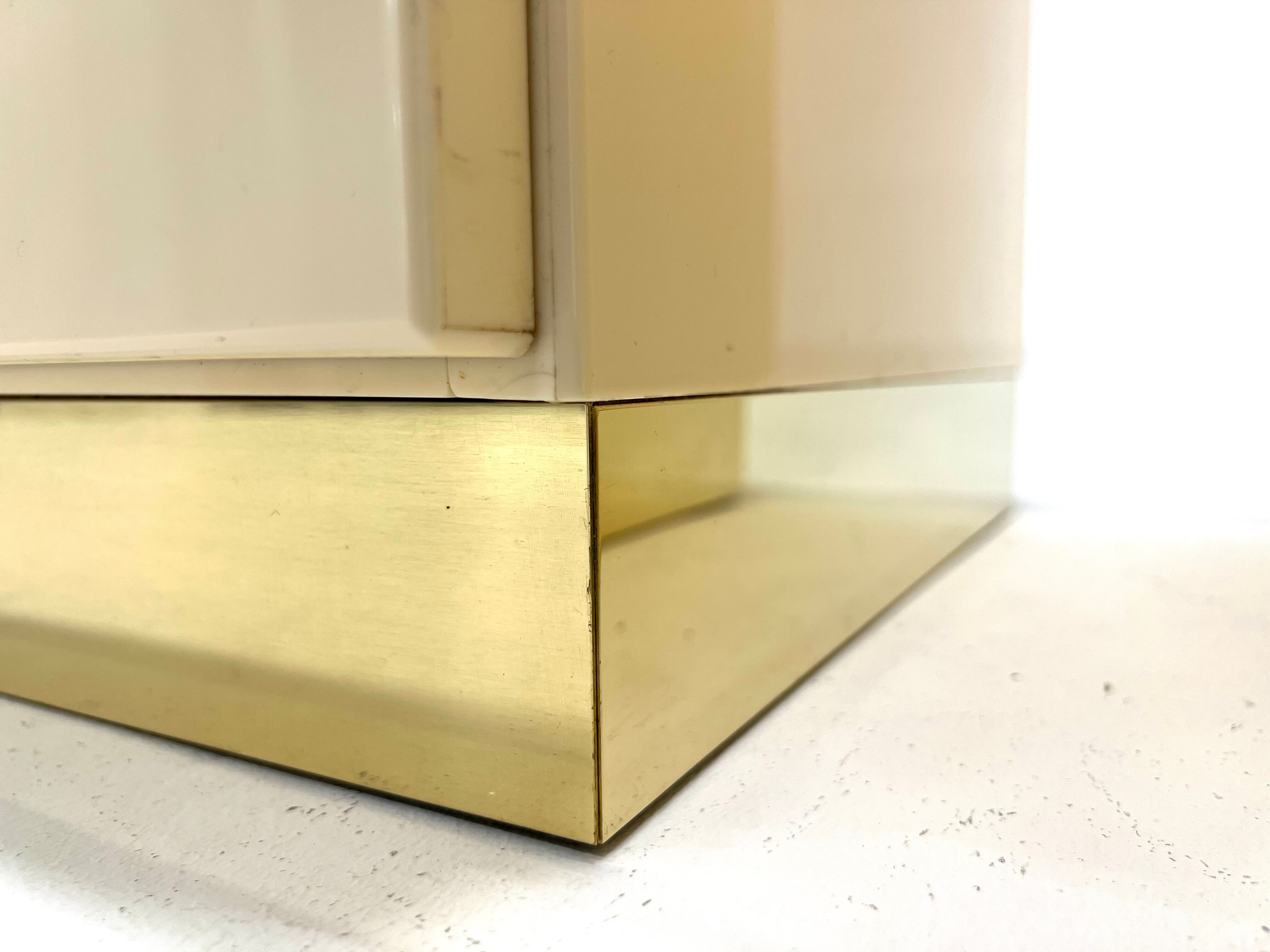 Pair of lacquer and brass bedside tables Éric Maville 1970