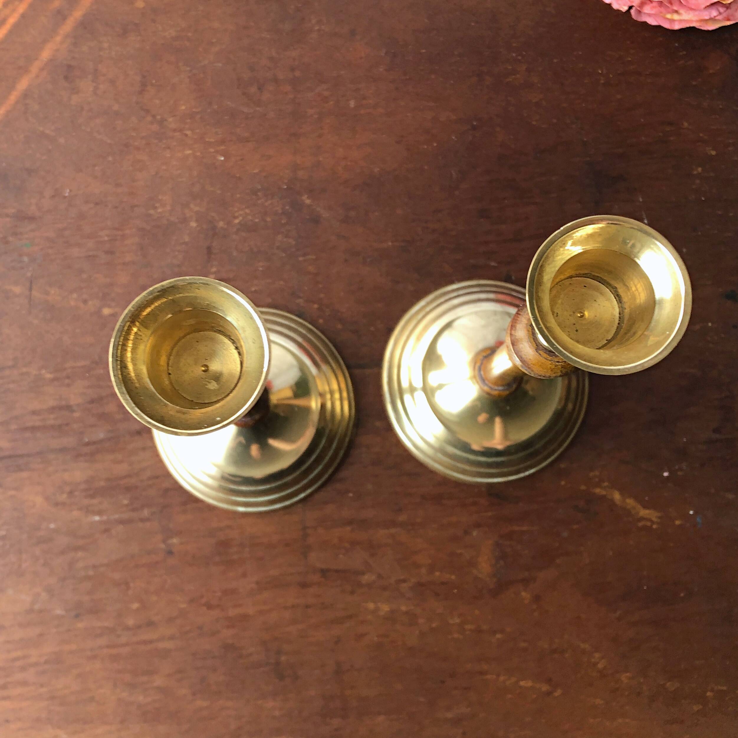 Pair of gilded brass and vintage Indian wood candlesticks