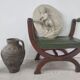 Green curule armchair