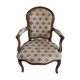 Fauteuil cabriolet de style Louis XVI garniture tapisserie fleurie