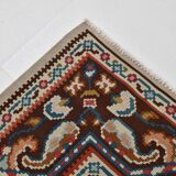 Un tapis persan oriental crème à motifs floraux – Élégance classique