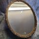 Miroir en métal doré de style Louis XV