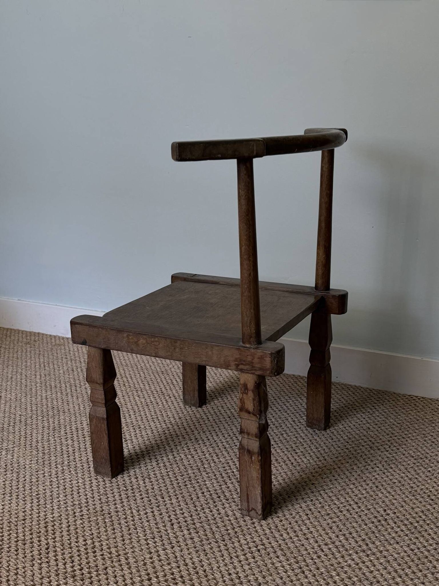 Handcrafted low chair in solid wood – Ivory Coast
