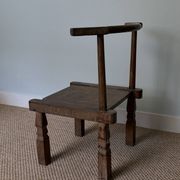 Handcrafted low chair in solid wood – Ivory Coast