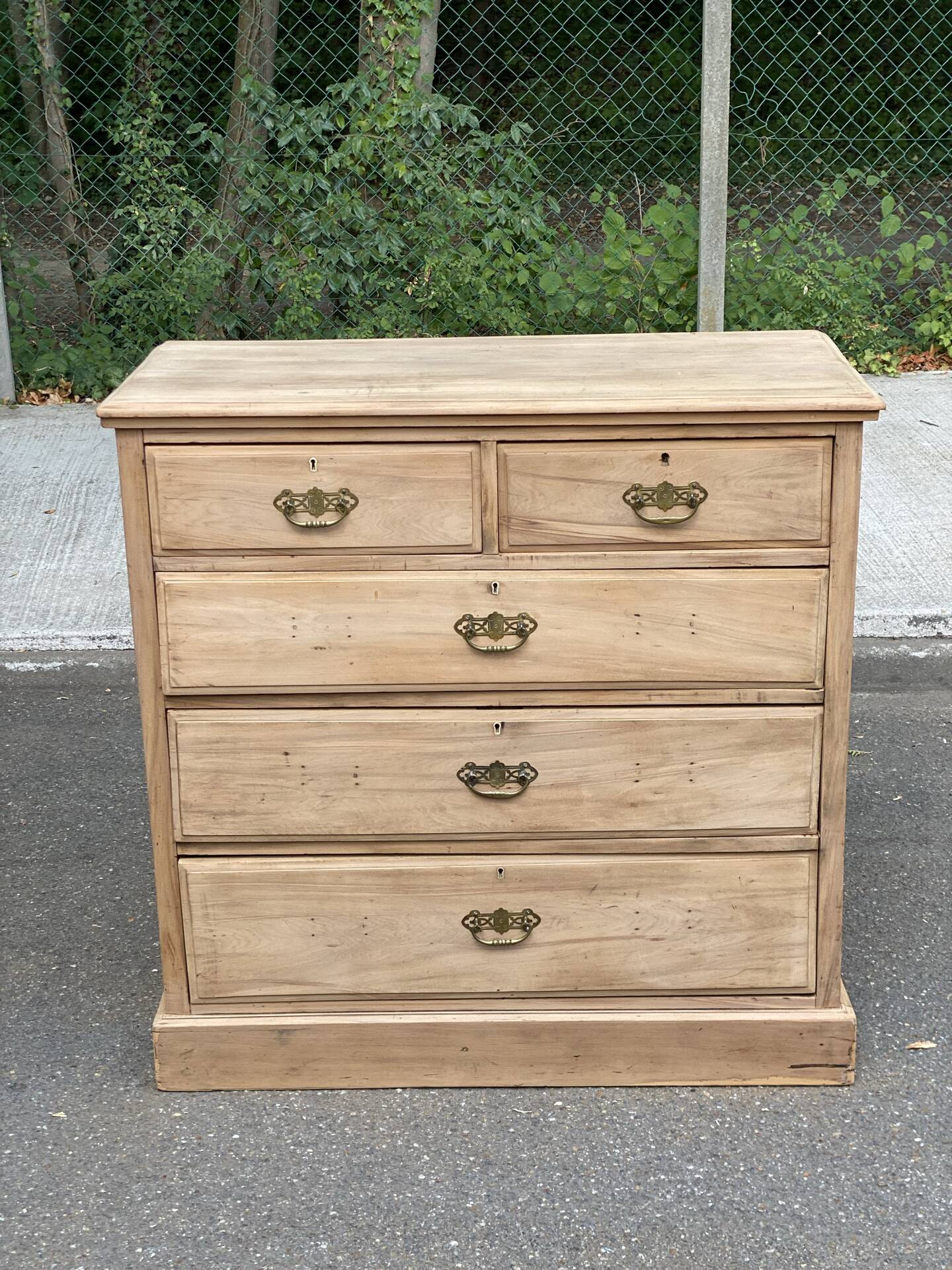 English stripped commode made of solid raw wood from the 19th century.