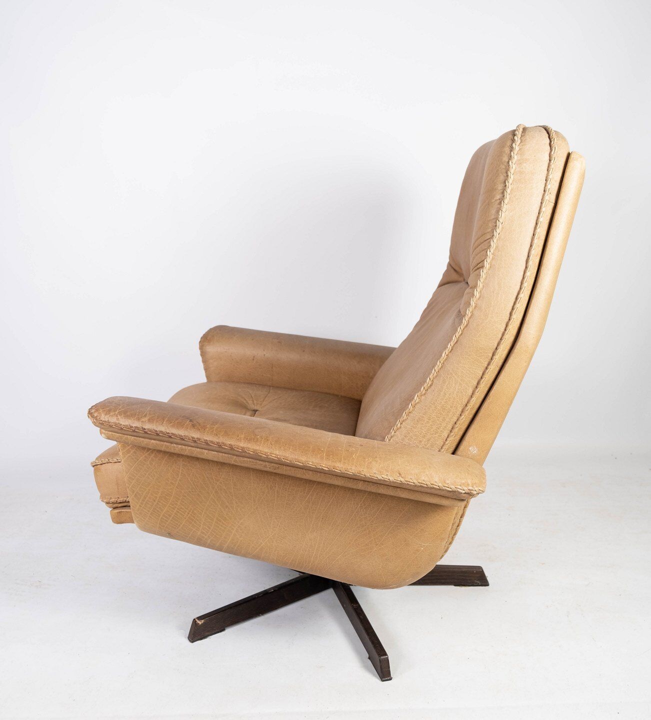 Armchair and stool in 1960s Danish leather and rosewood