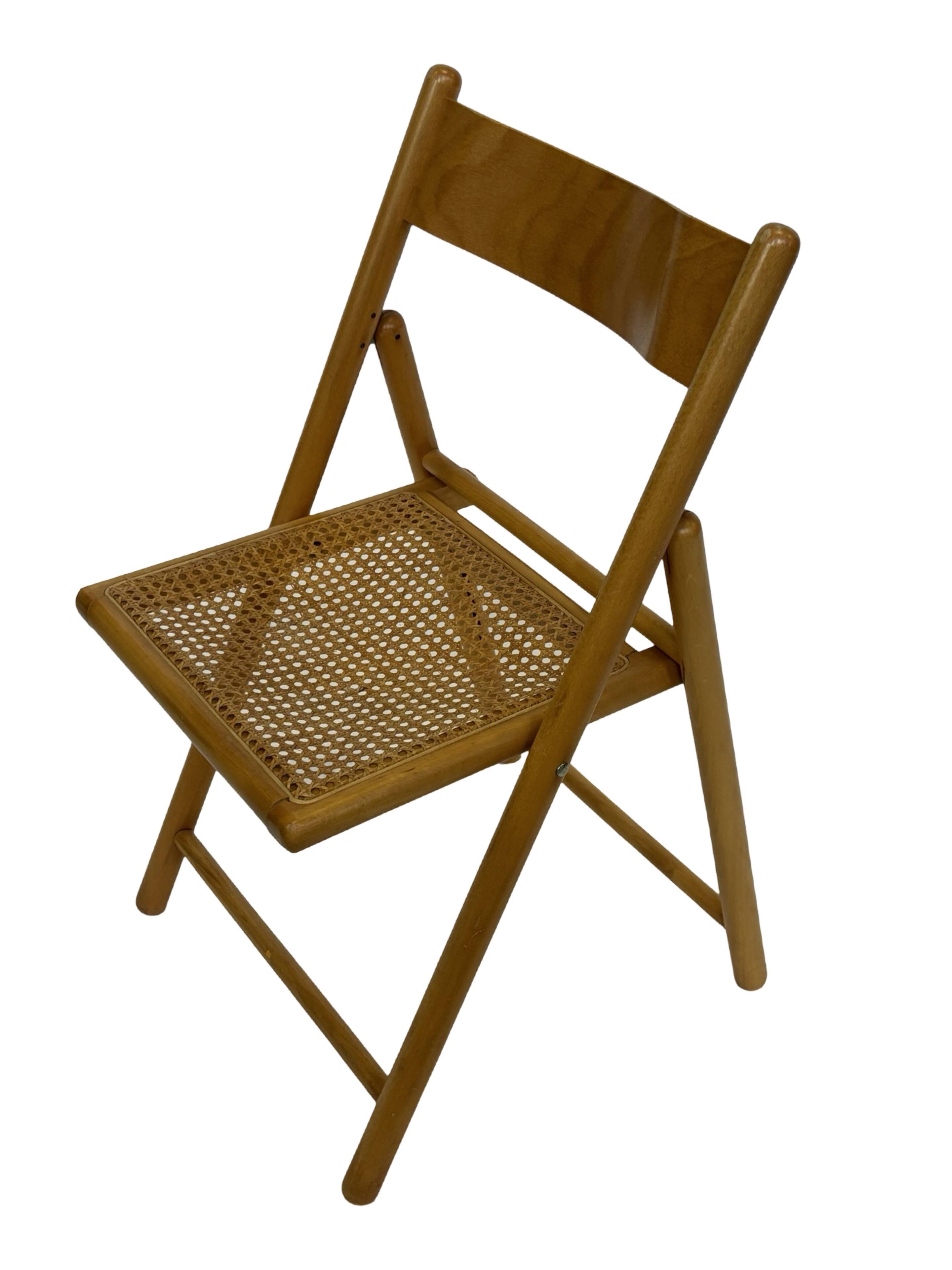 Vintage wooden folding chair with rattan seat 80s minimalist design