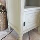 White patinated bedside table with a marble top
