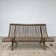 Cast iron garden bench from the late 19th century with slatted backrest.