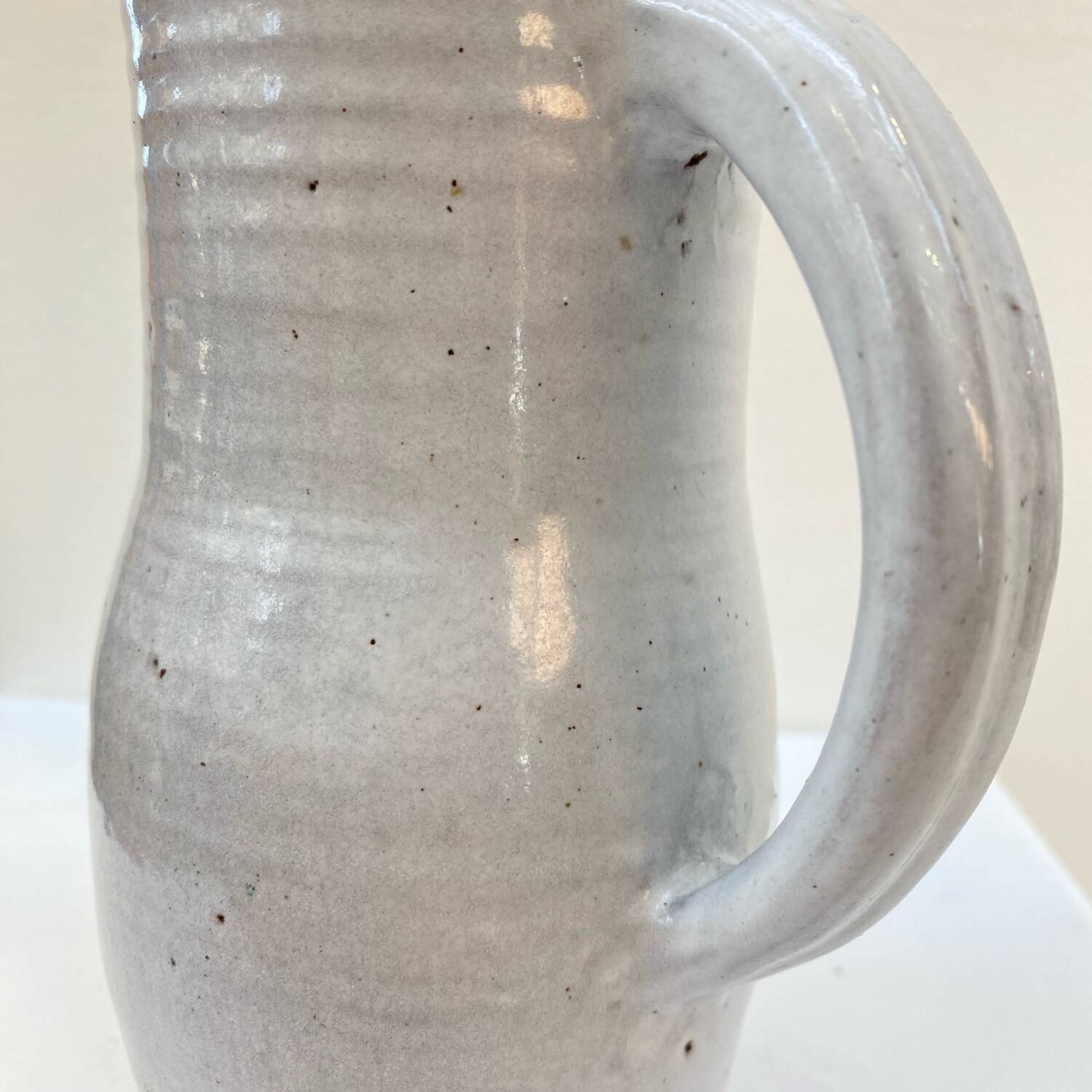 Enameled stoneware pitcher by Jeanne and Norbert Pierlot