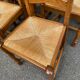 6 solid oak dining chairs with rush seats from the 1980s.
