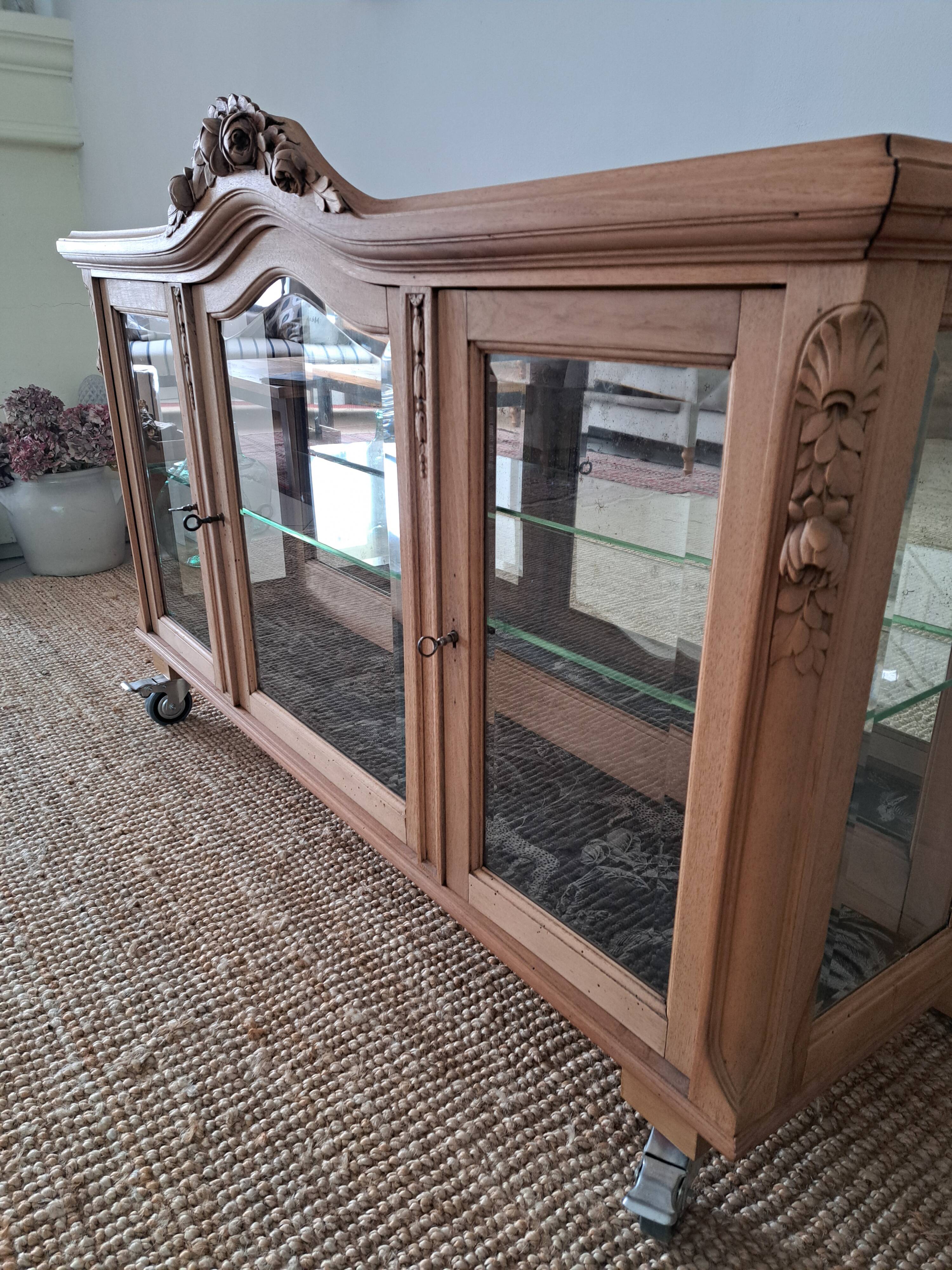 Vintage display cabinet in light wood