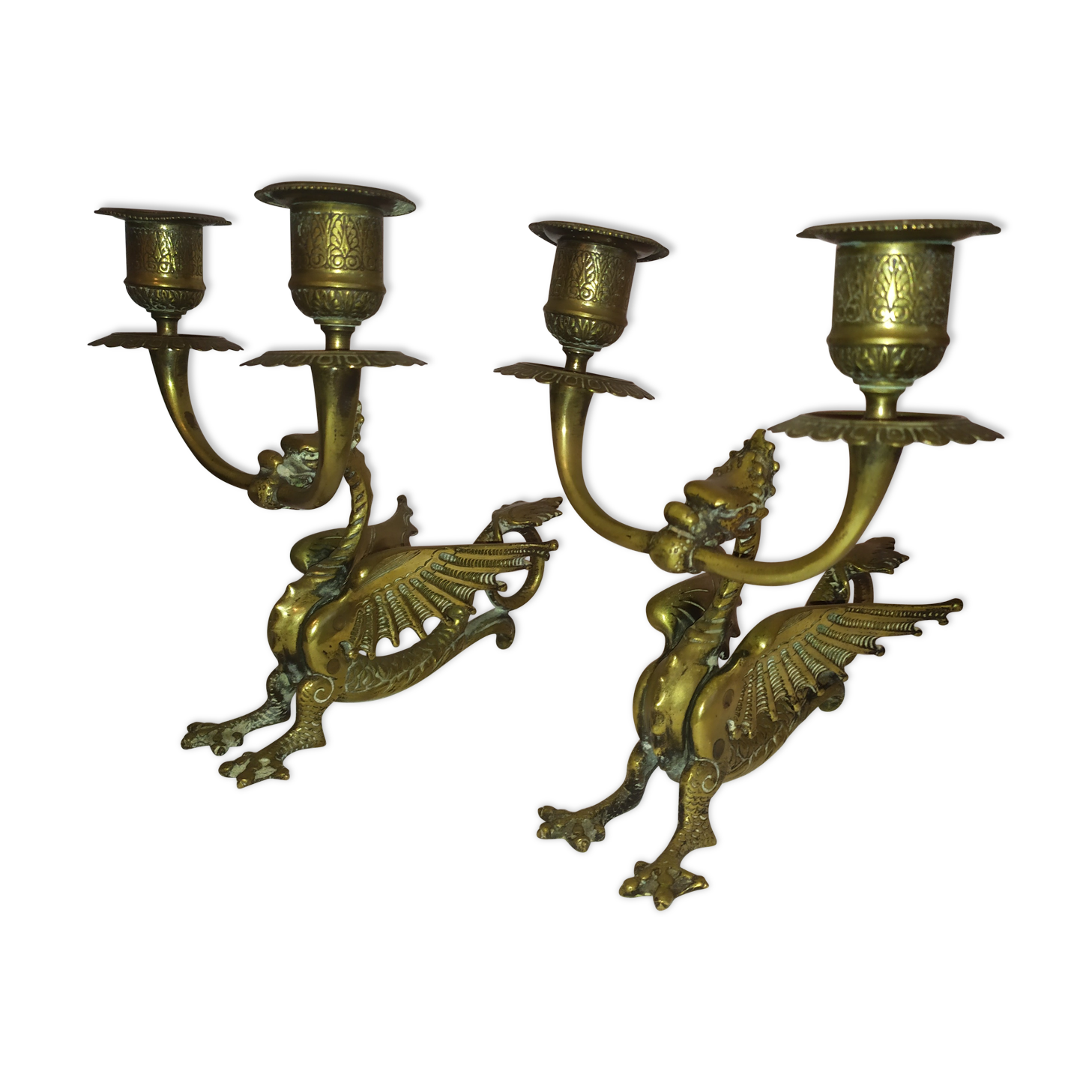 Pair of candlesticks with old chimera dragons hands