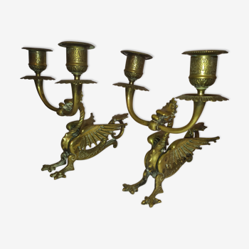 Pair of candlesticks with old chimera dragons hands