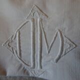 Embroidered sheet and 2 assorted piles