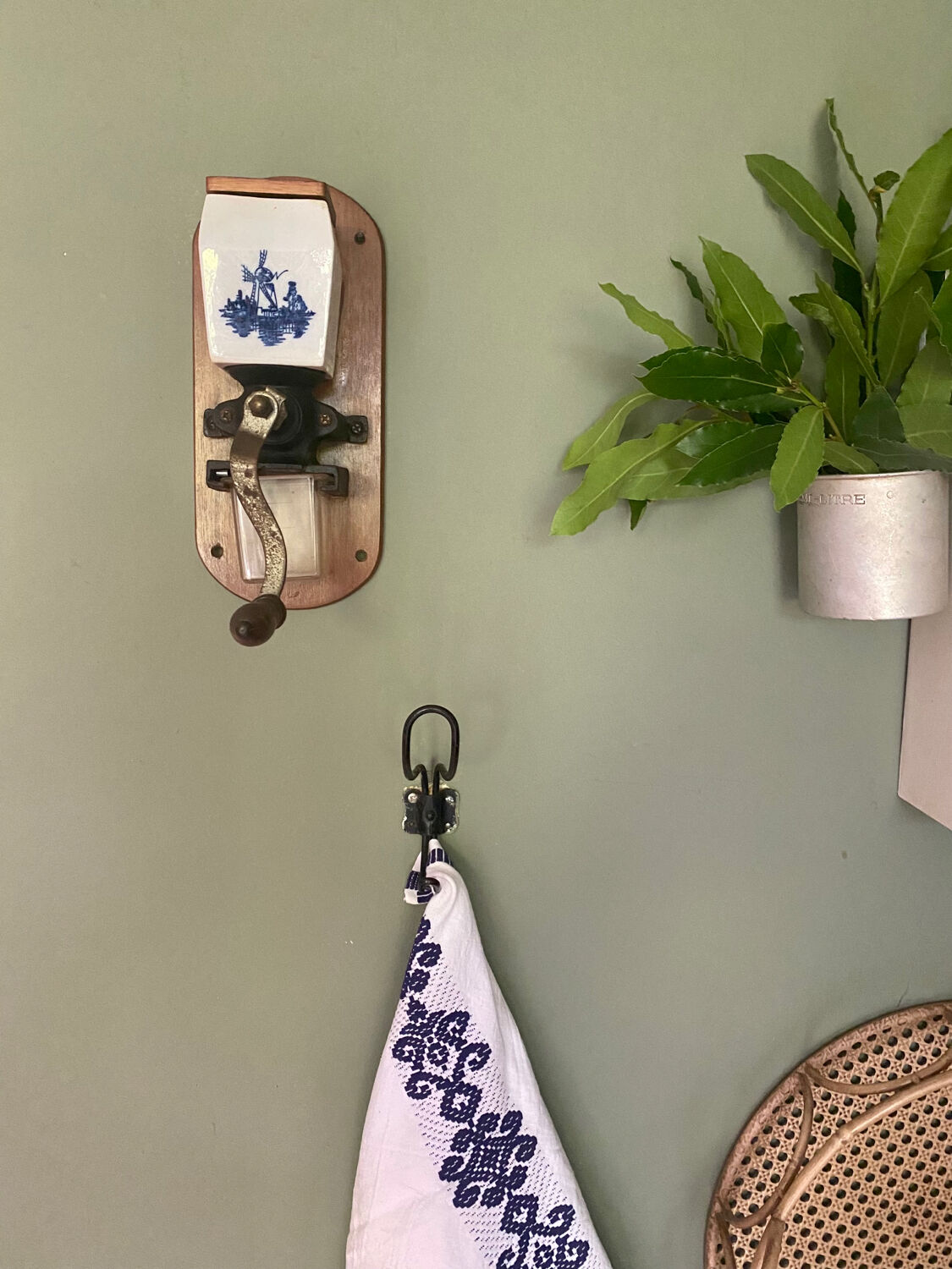 Old wall-mounted coffee grinder