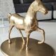 Large vintage horse in exercise figurine on oval base, in polished brass 26 x 19 cm