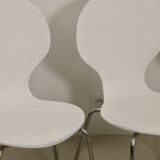 Set of 4 living room chairs in curved wood veneer and chrome base from the 70s.