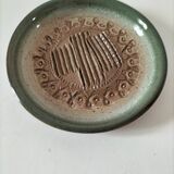 Signed stoneware bowl from Puisaye, relief decoration.