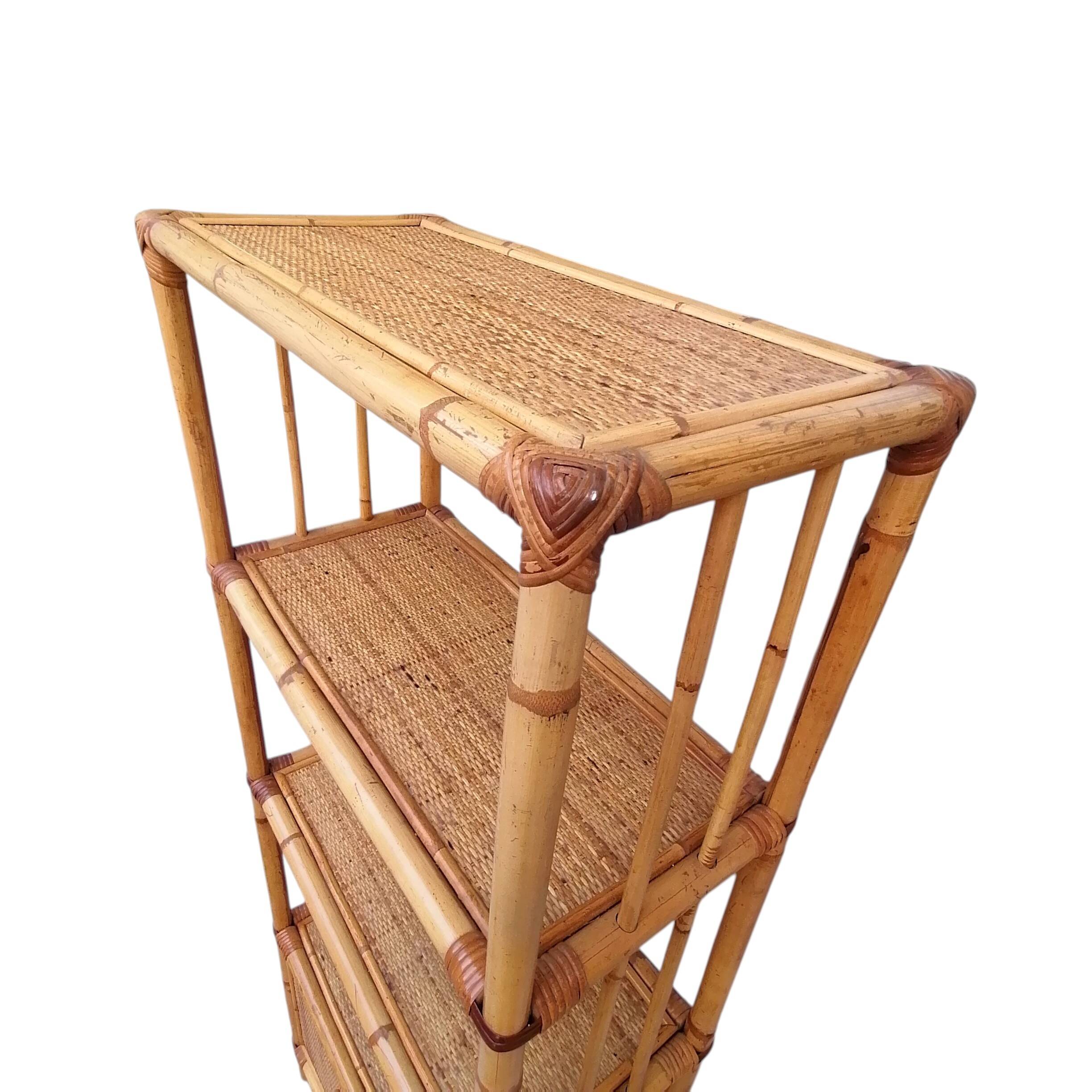 Bamboo and wicker bookshelf, vintage boho-chic from the '70s.