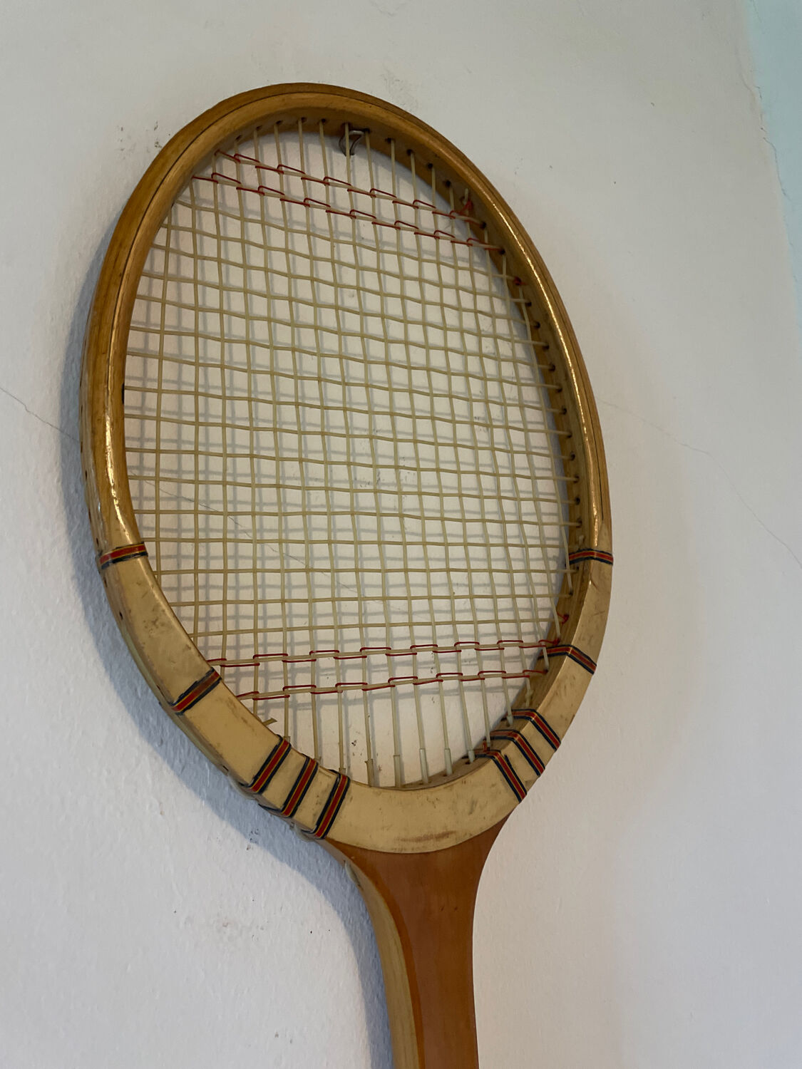 Vintage blond wood tennis racket
