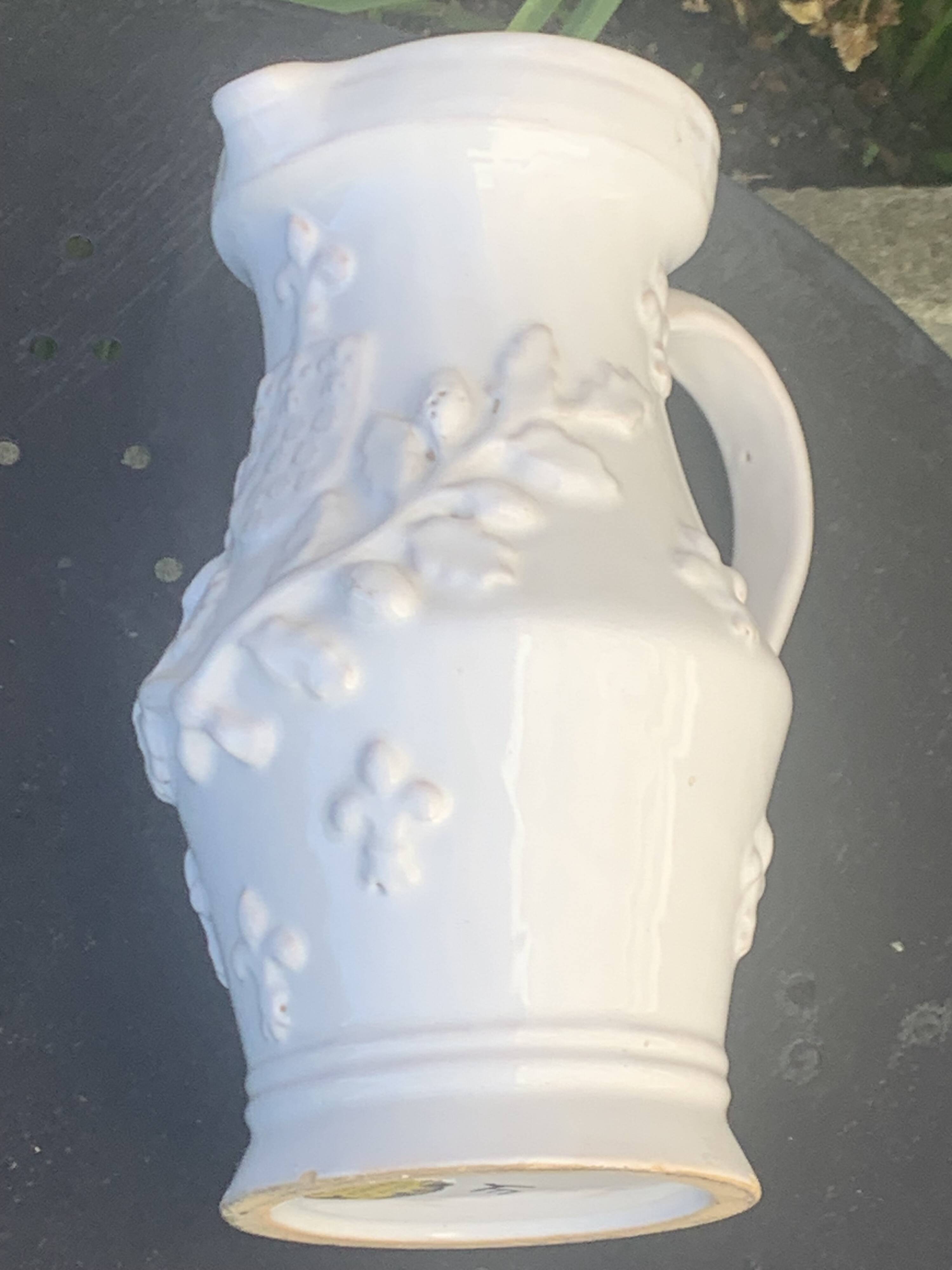 Carafe, pitcher signed Émile Tessier, Old France, in slip, ceramic