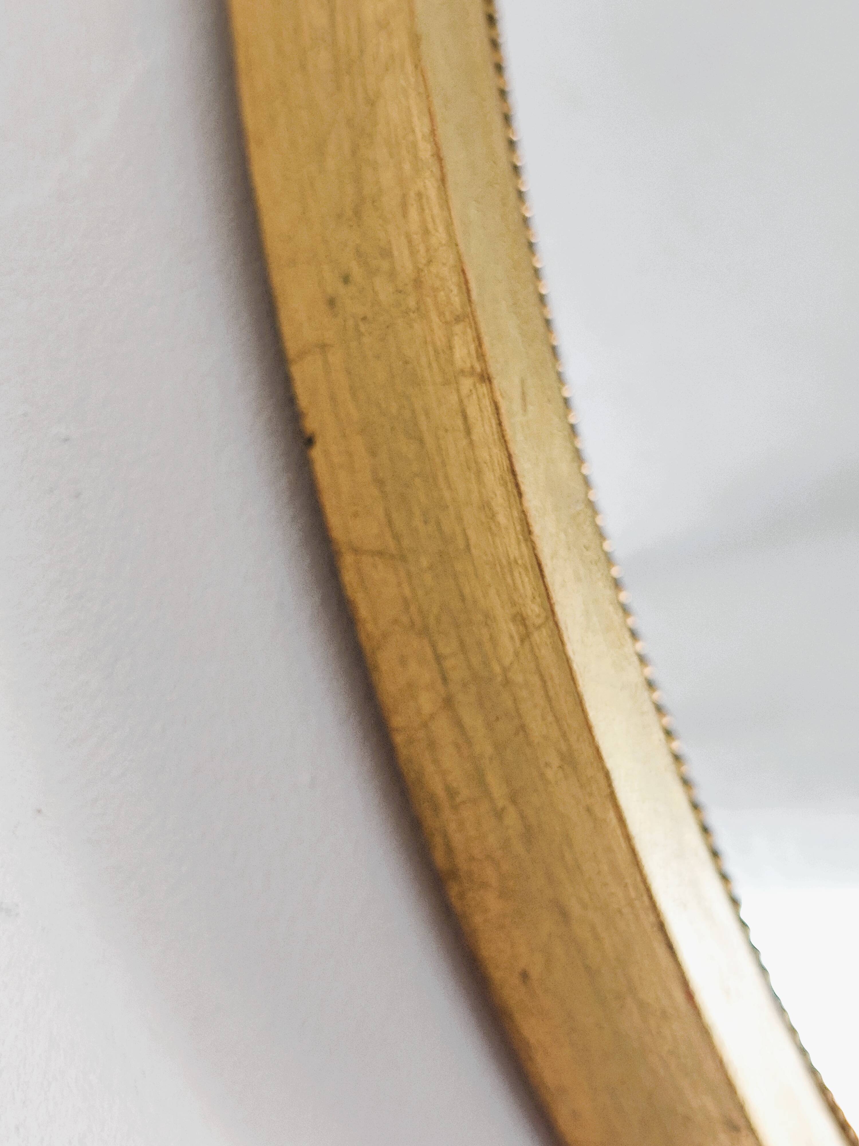 Antique gold oval mirror