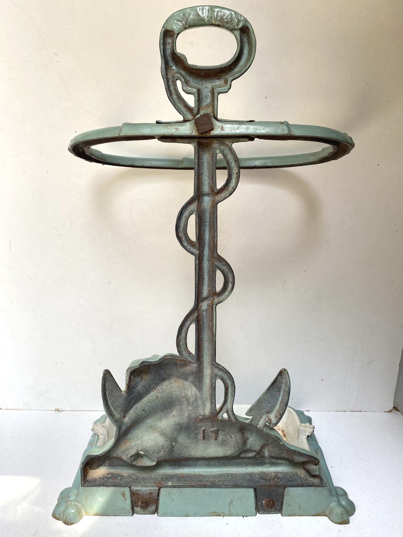 Enameled cast iron umbrella stand from the early 20th century
