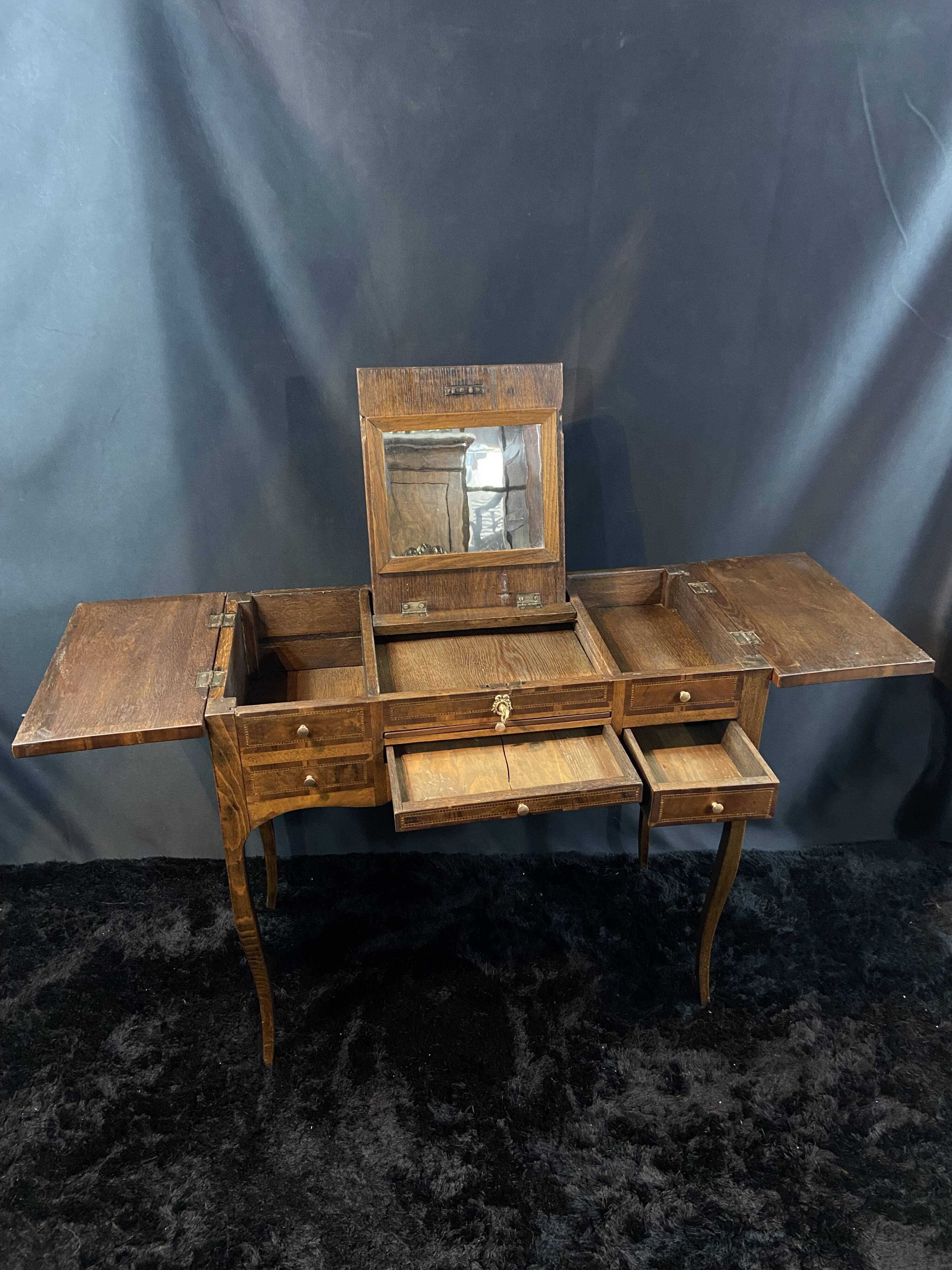 19th-century hairdresser with marquetry decoration on oak in the Louis XV Transition style.