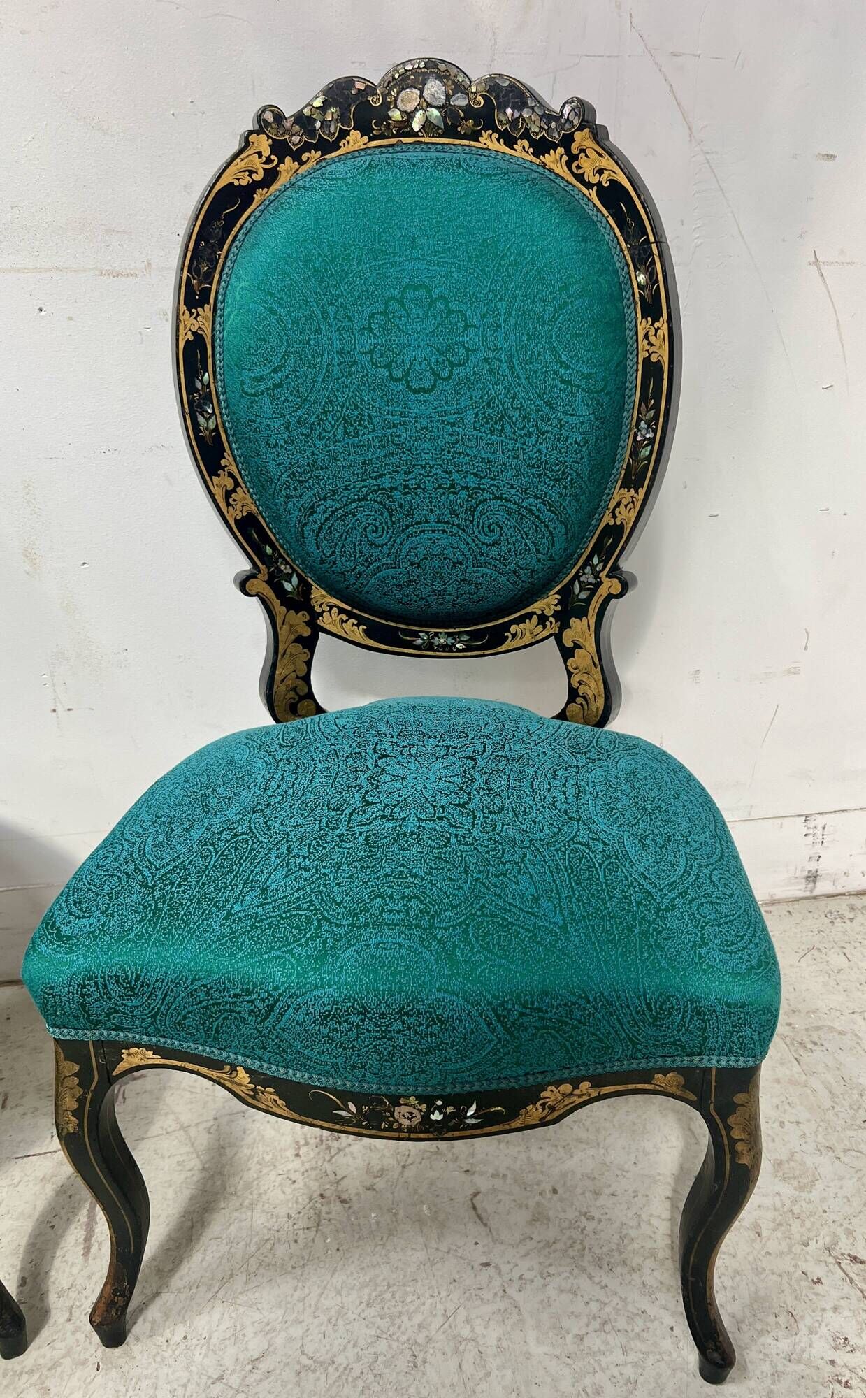 Pair of Napoleon III chairs in black lacquered wood, 19th century.