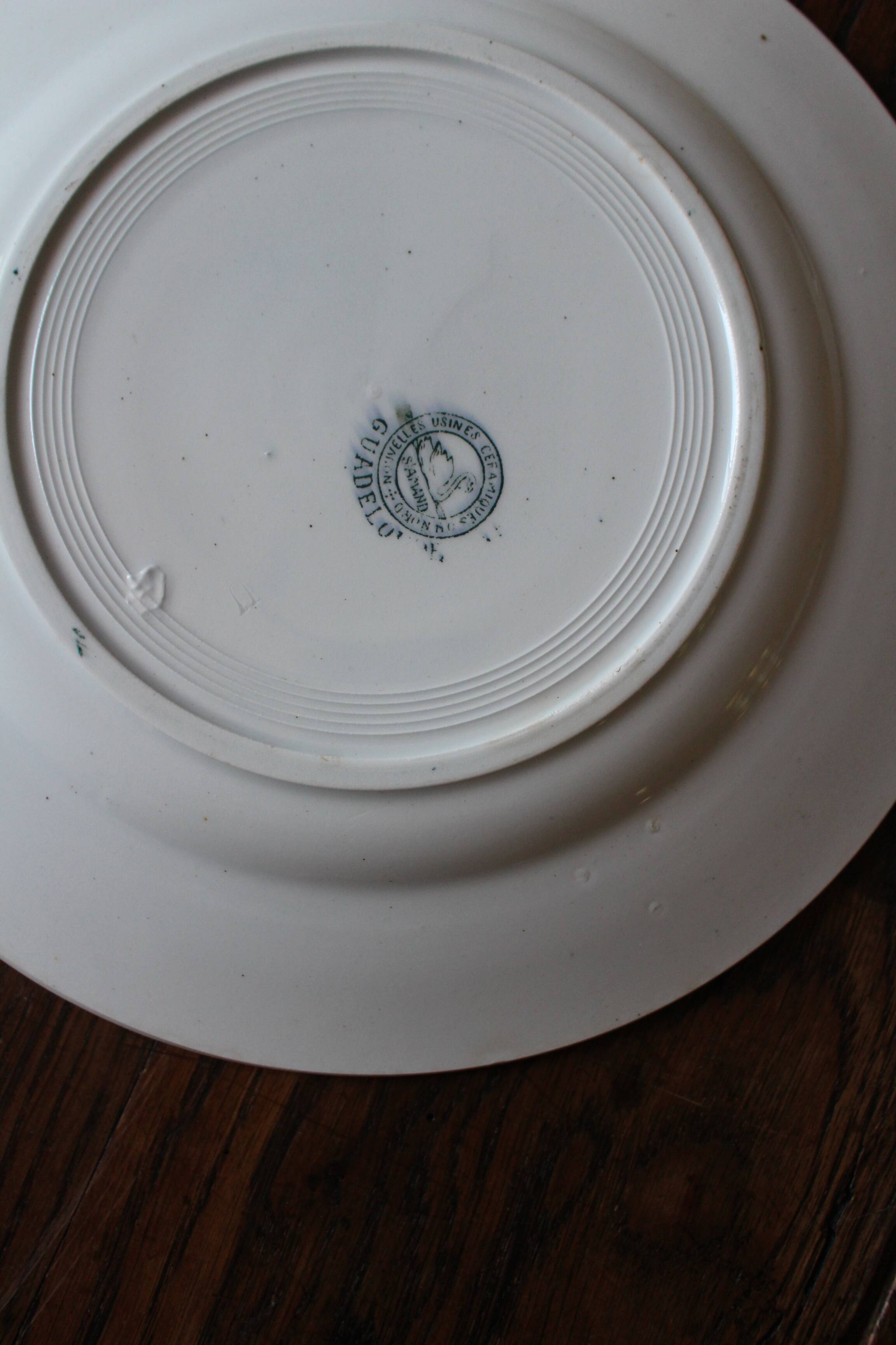 Set of 4 mismatched blue flat plates