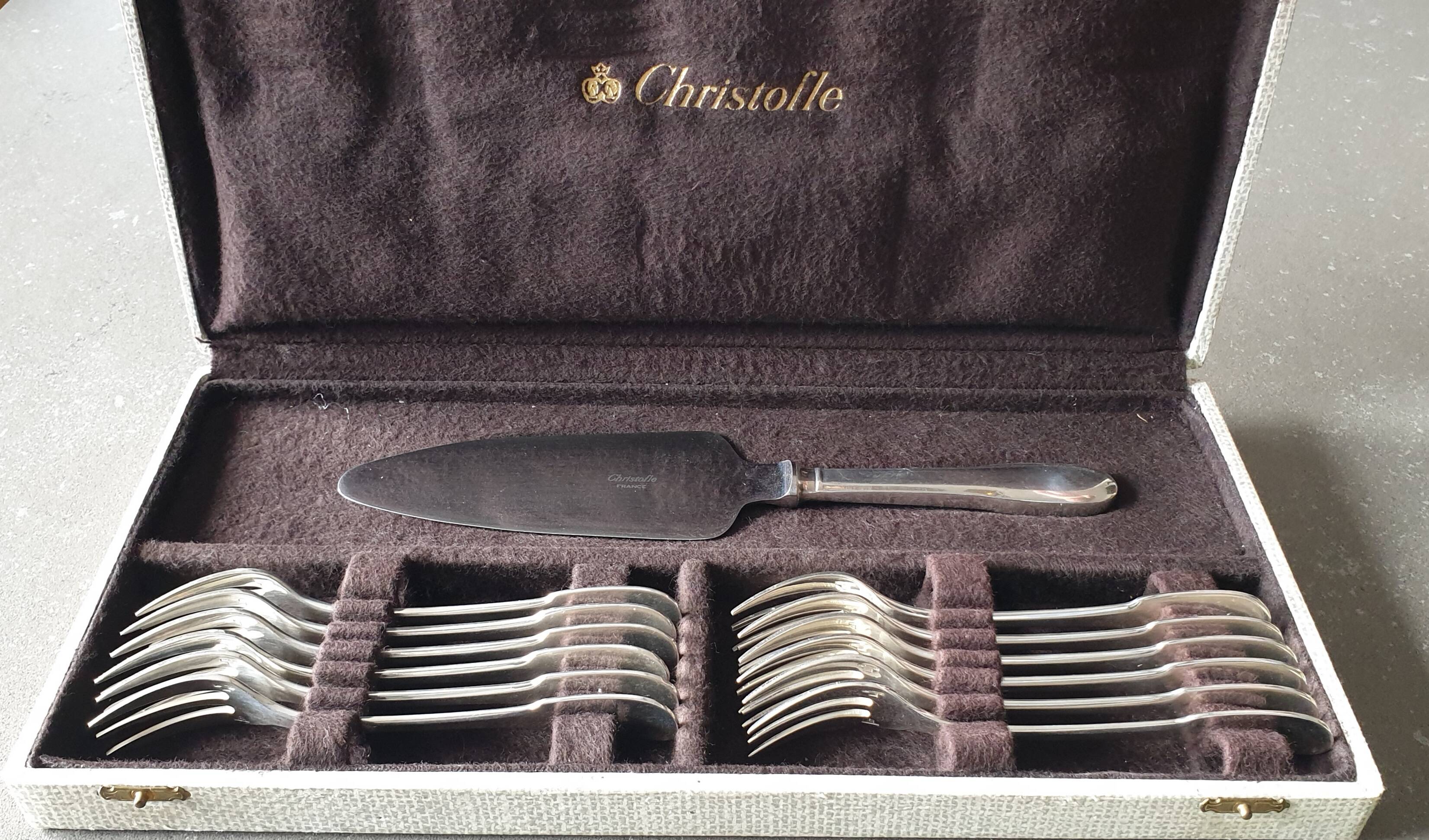 Set of 12 dessert forks and a cake server.