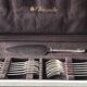 Set of 12 dessert forks and a cake server.