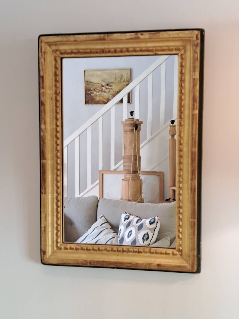 Antique mirror in wood and gilded stucco