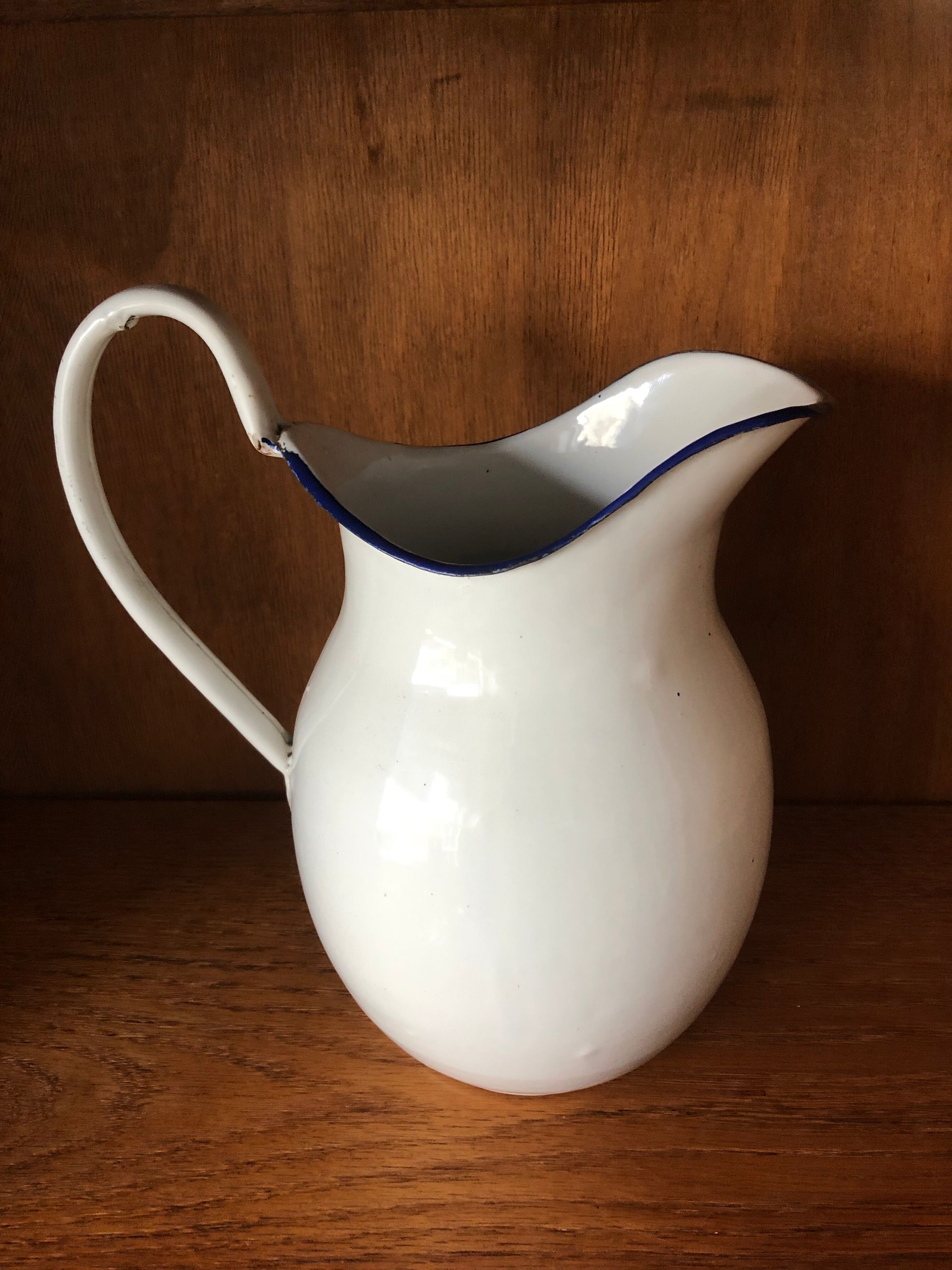 Enamelled plate pitcher