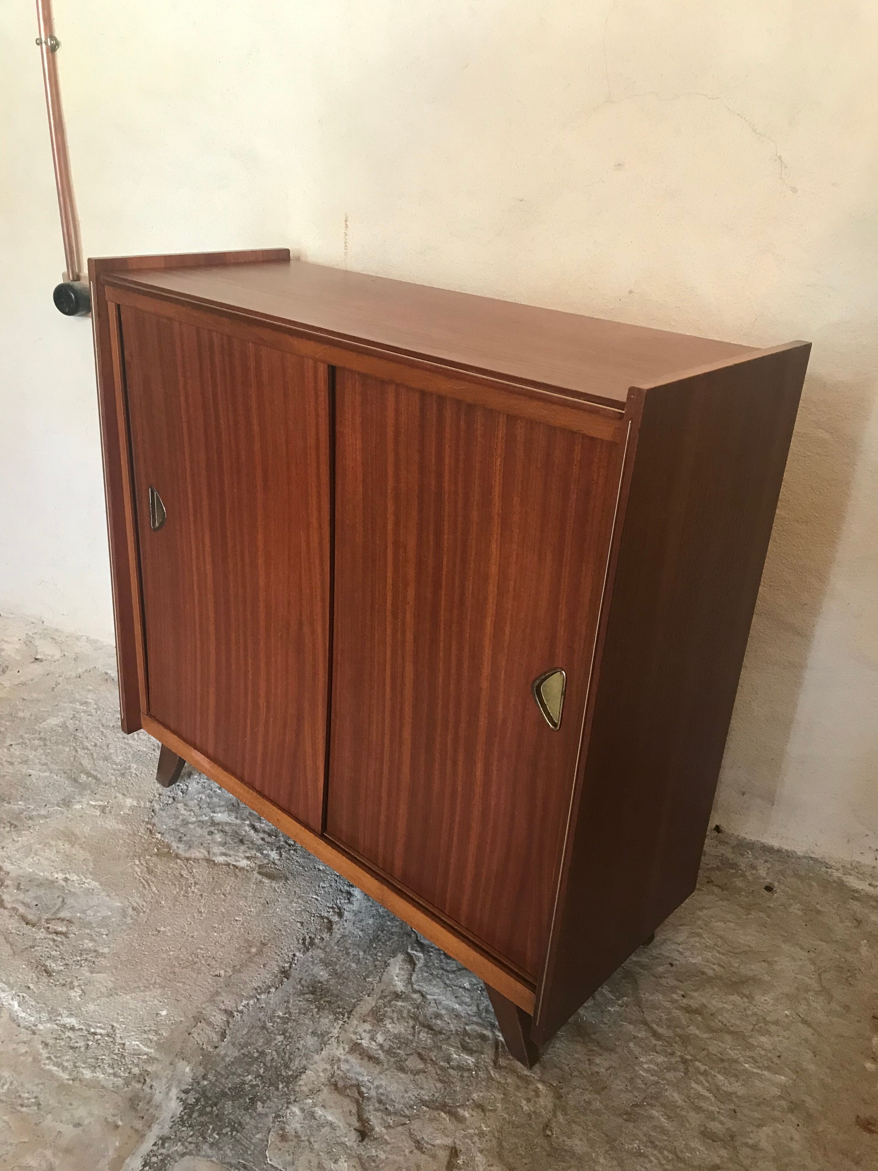 Vintage storage cabinet teak veneer sliding door compass feet