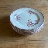 A series of eight flat plates in Terre de fer earthenware, Favori aux oiseaux model - pink tint