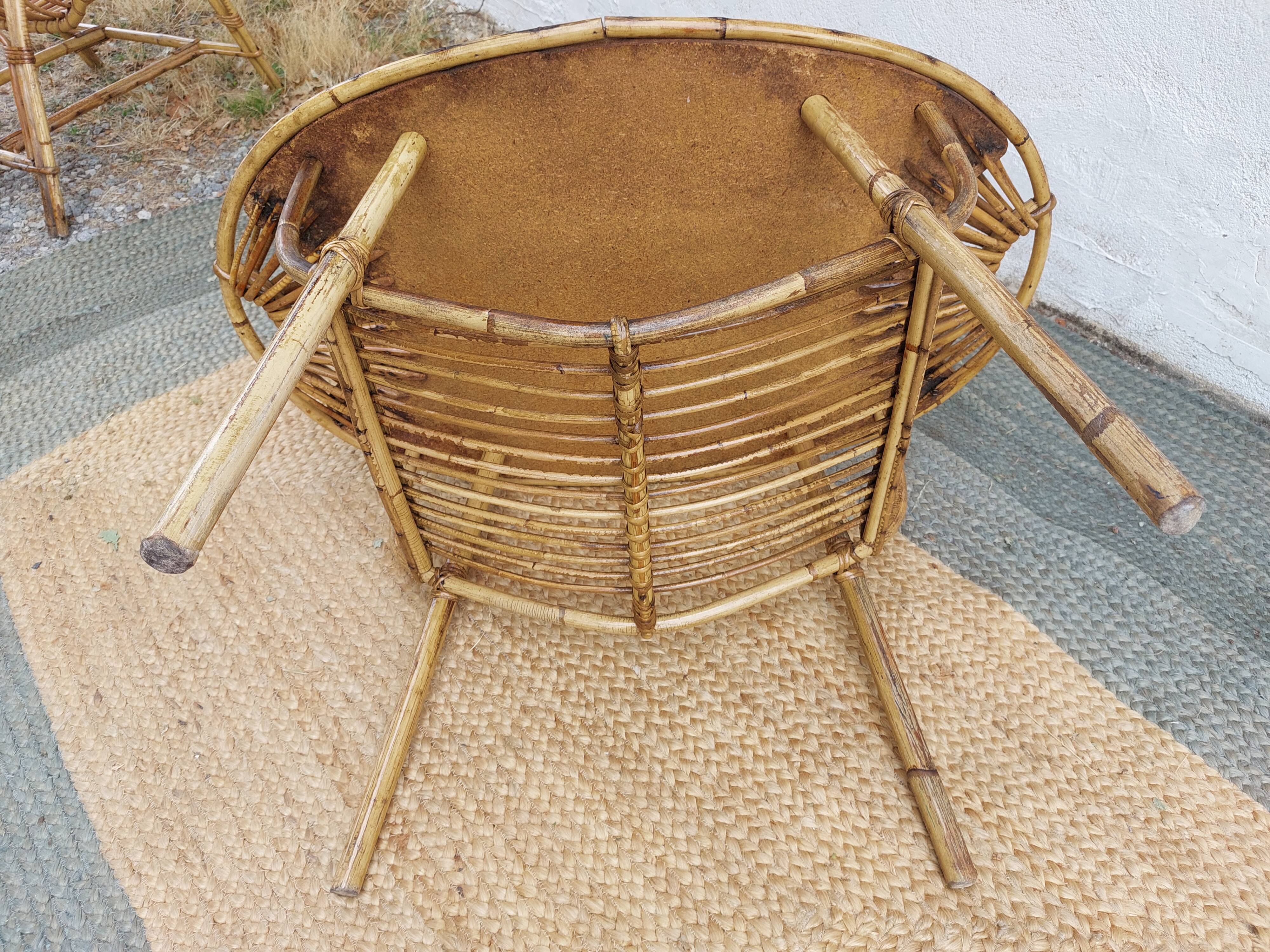 4 armchairs and a coffee table made of rattan and bamboo wood, vintage.