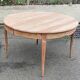 Renovated round dining table in solid wood, Louis XV style from the 19th century.