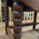 Wooden table with gateleg flaps