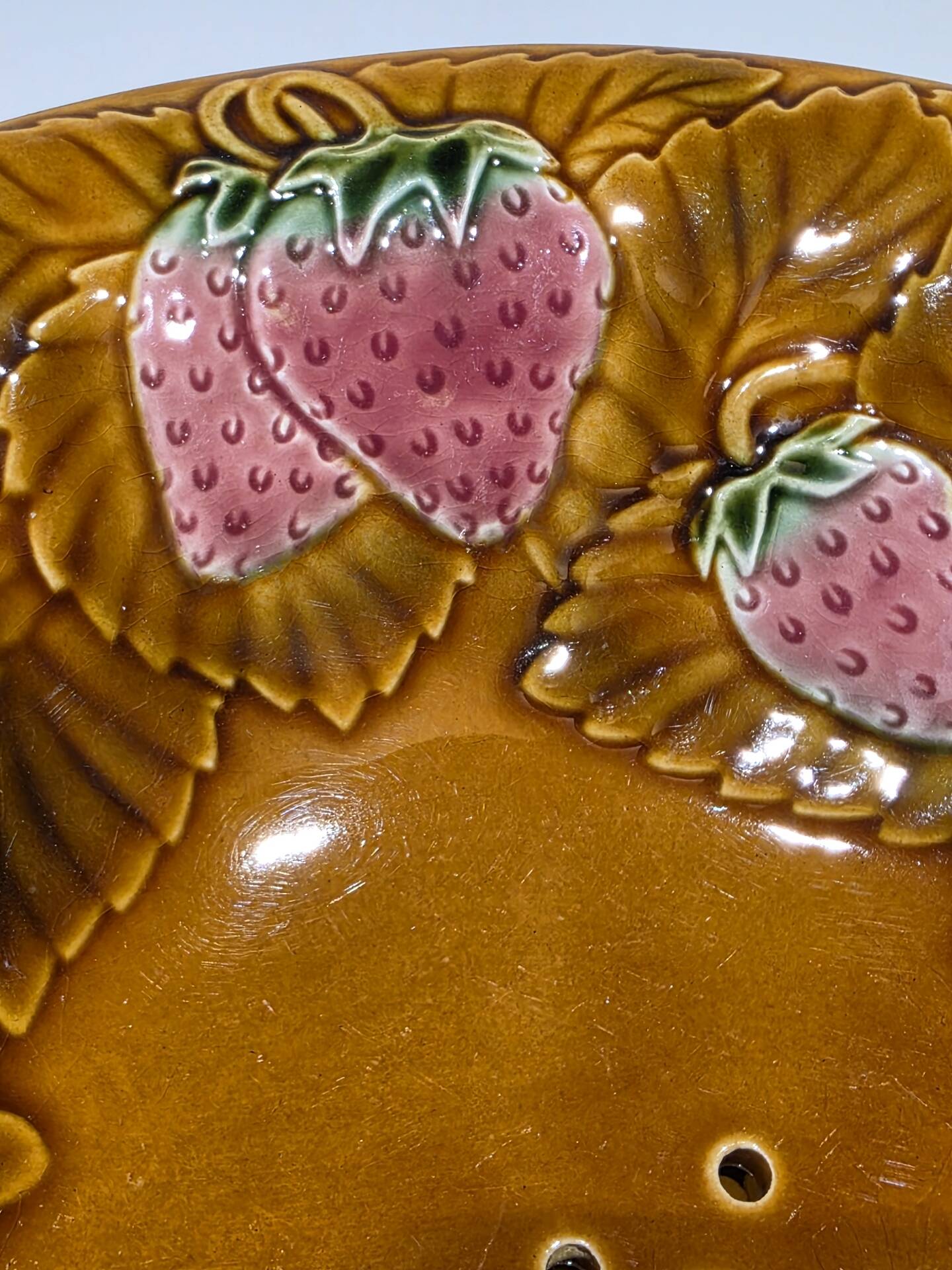 Fruit strainer in Barbotine and serving dish from Salin les Bains.