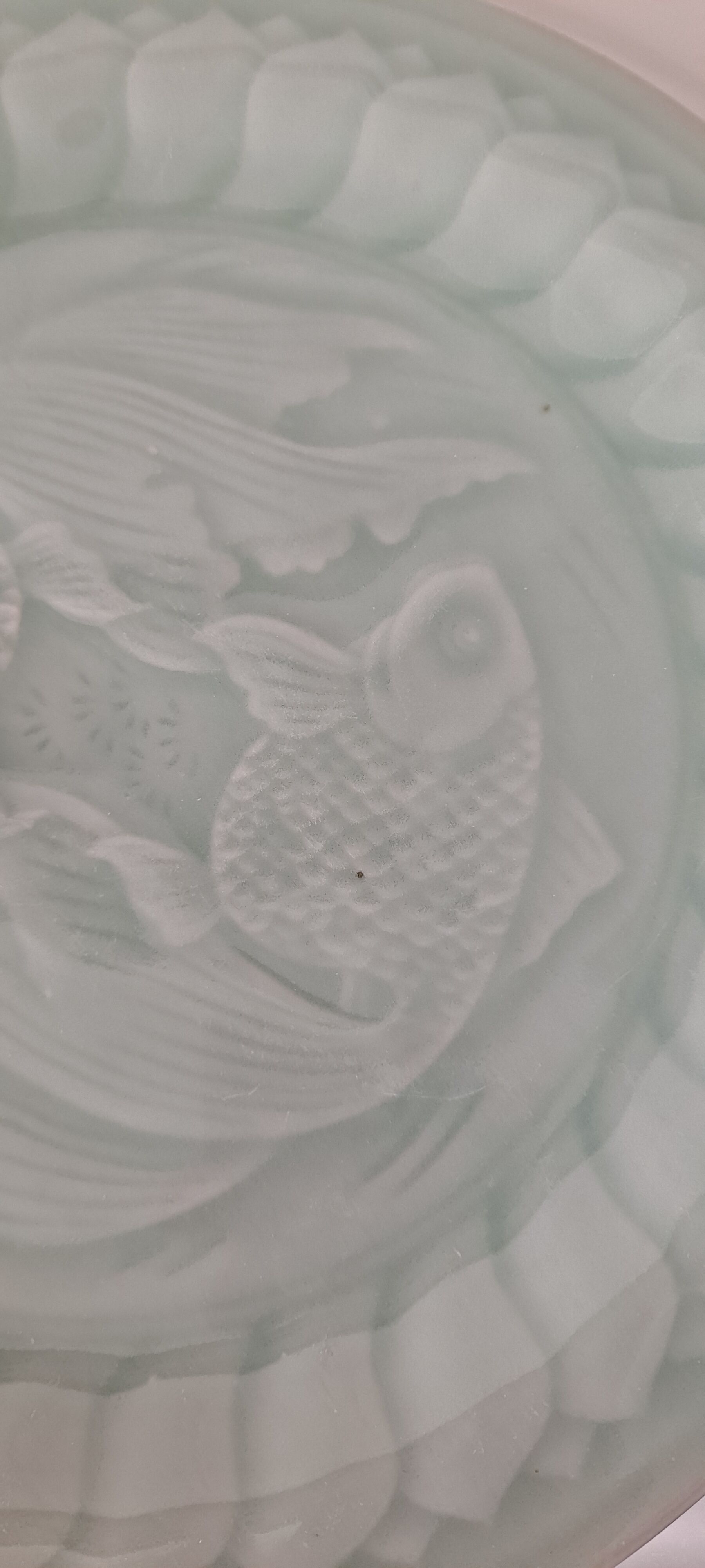 Celadon green plate with fish